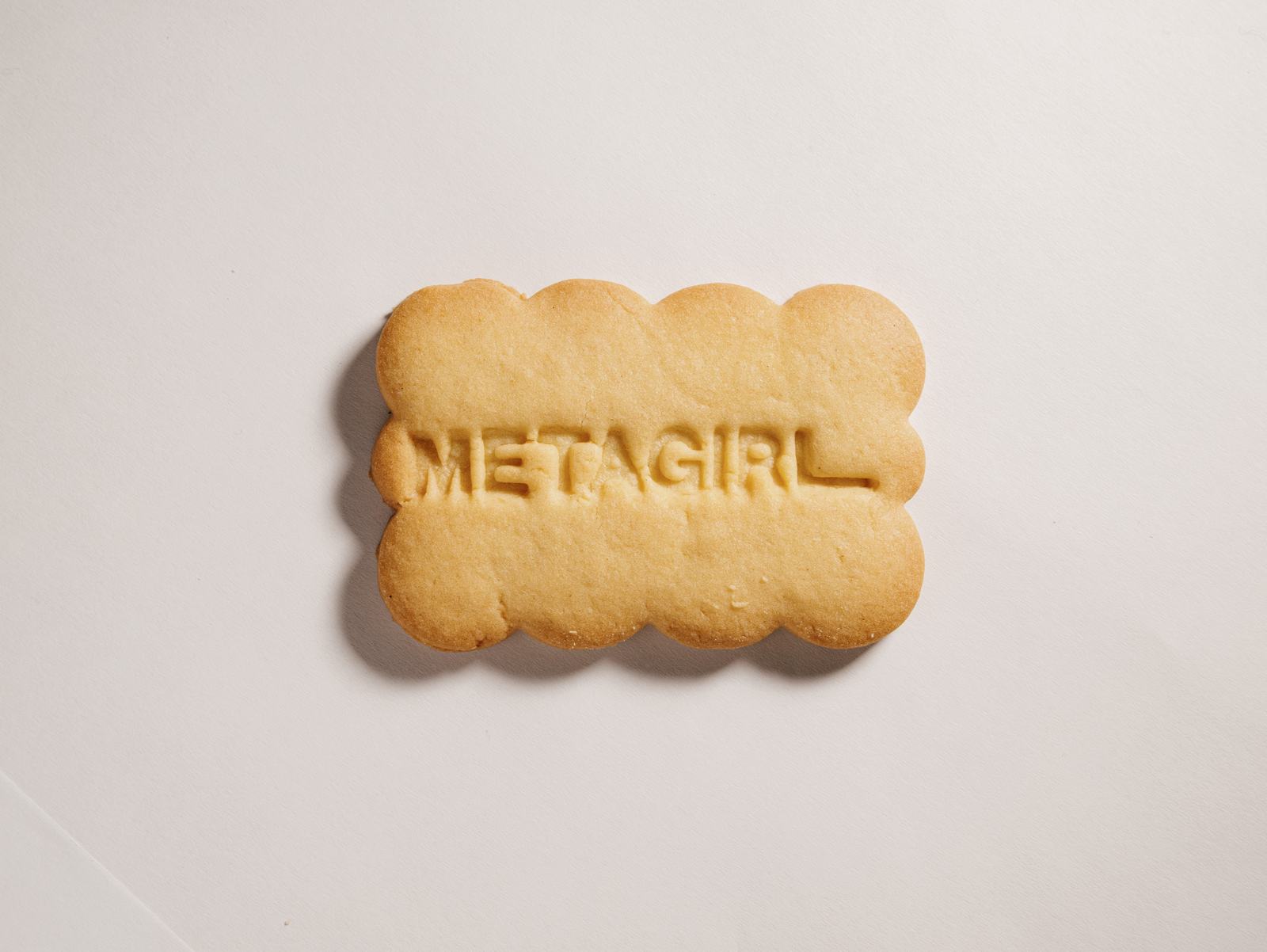 Shortbread cookie stamped with a company logo